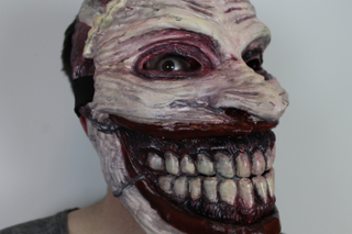 Illustration for article titled This Joker Mask Is An Amazing, 3-D Printed Nightmare